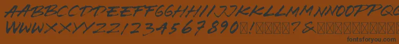 BrushWedco-Schriftart – Schwarze Schriften auf braunem Hintergrund