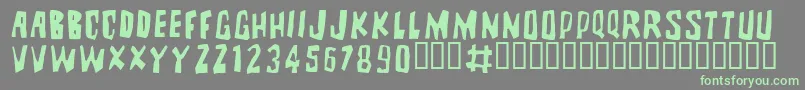 BRUTALITYEXTRA Font – Green Fonts on Gray Background