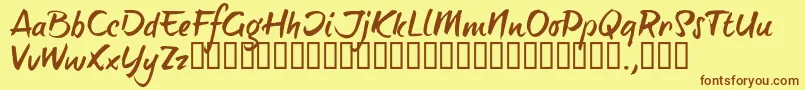 フォントBTTTRIAL – 茶色の文字が黄色の背景にあります。