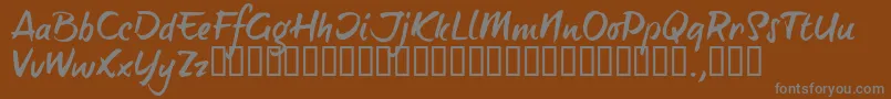 フォントBTTTRIAL – 茶色の背景に灰色の文字