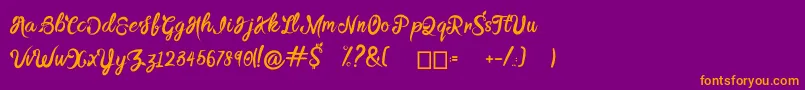 BTX DAINTY CREEK-Schriftart – Orangefarbene Schriften auf violettem Hintergrund