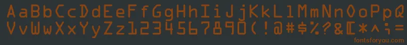 Czcionka Ocrastd – brązowe czcionki na czarnym tle