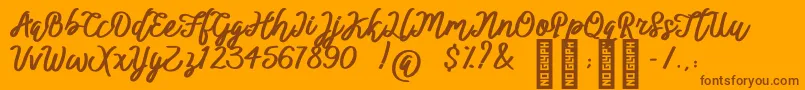 Weitere Informationen zur BTX ittally-Schriftart BTX ittally-Schriftart – Braune Schriften auf orangefarbenem Hintergrund