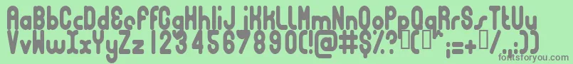 Fonte BUBBCC   – fontes cinzas em um fundo verde