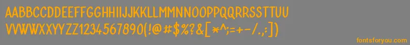 フォントBublina 030b – オレンジの文字は灰色の背景にあります。