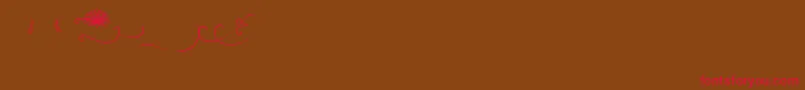 Budapest Swashes Font – Red Fonts on Brown Background