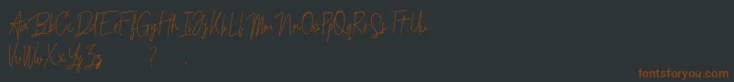 Budaphest-fontti – ruskeat fontit mustalla taustalla