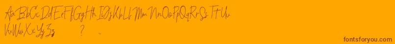 Czcionka Budaphest – brązowe czcionki na pomarańczowym tle