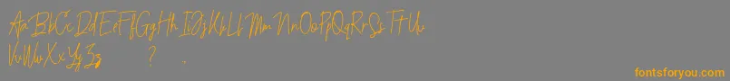 Budaphest-Schriftart – Orangefarbene Schriften auf grauem Hintergrund