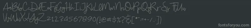 フォントBudayut – 黒い背景に灰色の文字