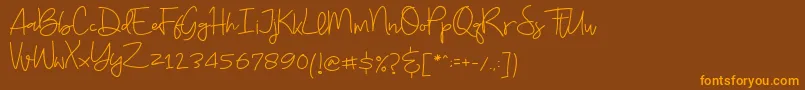 Budayut Font – Orange Fonts on Brown Background