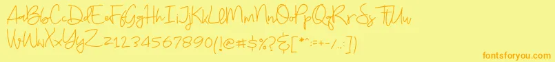 フォントBudayut – オレンジの文字が黄色の背景にあります。