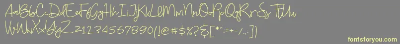 Budayut Font – Yellow Fonts on Gray Background
