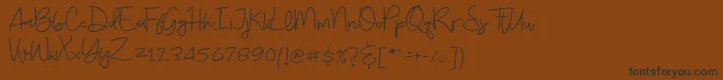 Budayut Font – Black Fonts on Brown Background