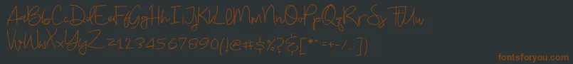 Budayut Font – Brown Fonts on Black Background