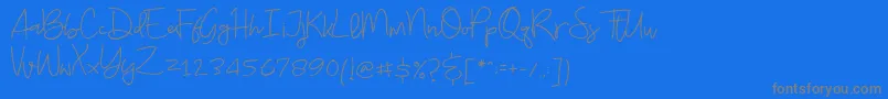 フォントBudayut – 青い背景に灰色の文字