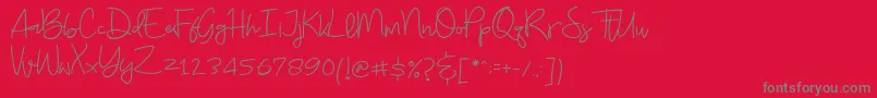 Budayut-Schriftart – Graue Schriften auf rotem Hintergrund