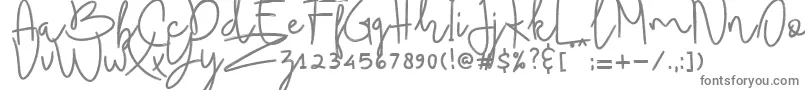 フォントBudhayanti script – 白い背景に灰色の文字