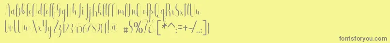 フォントBuffalo – 黄色の背景に灰色の文字