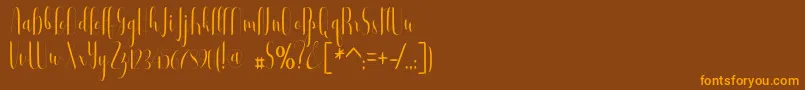 Buffalo-Schriftart – Orangefarbene Schriften auf braunem Hintergrund
