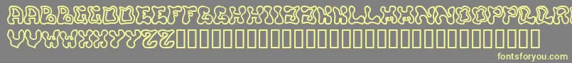 Buffy Font – Yellow Fonts on Gray Background