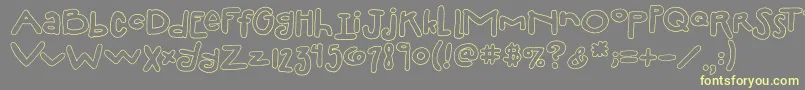 2peasSillyFillIn Font – Yellow Fonts on Gray Background