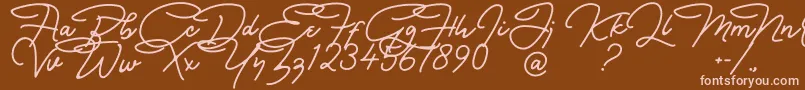 Czcionka Bullstander Free Font – różowe czcionki na brązowym tle