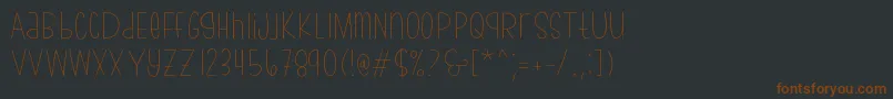 Шрифт bumblebeethin Demo – коричневые шрифты на чёрном фоне