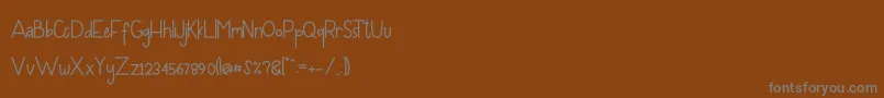 Czcionka Bumblle – szare czcionki na brązowym tle