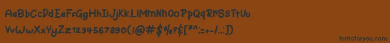 Fonte Bunny Hopper – fontes pretas em um fundo marrom