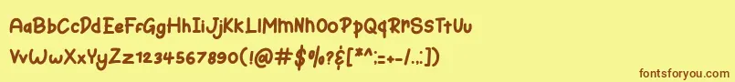フォントBunny Hopper – 茶色の文字が黄色の背景にあります。