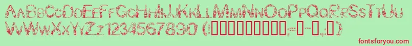 Bunny Rabbits-Schriftart – Rote Schriften auf grünem Hintergrund