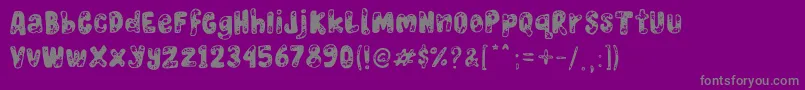 Burn Wood-Schriftart – Graue Schriften auf violettem Hintergrund