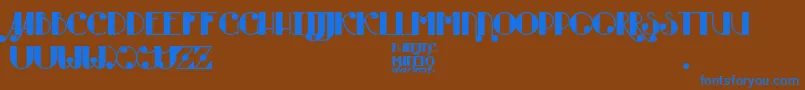 Burning Manero-fontti – siniset fontit ruskealla taustalla