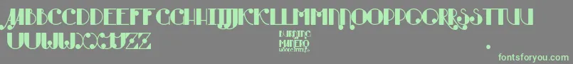 フォントBurning Manero – 灰色の背景に緑のフォント