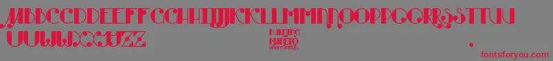 フォントBurning Manero – 赤い文字の灰色の背景