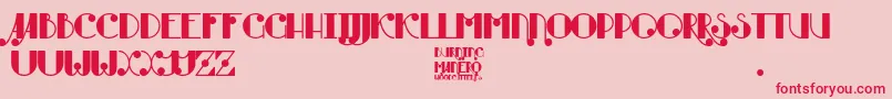 フォントBurning Manero – ピンクの背景に赤い文字