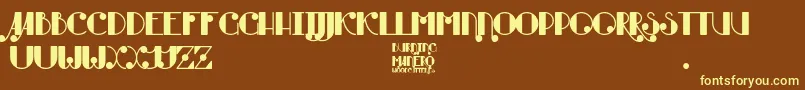 Burning Manero Font – Yellow Fonts on Brown Background