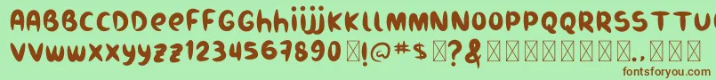 Burukuduk-Schriftart – Braune Schriften auf grünem Hintergrund