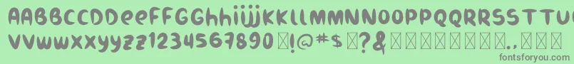 Burukuduk Font – Gray Fonts on Green Background