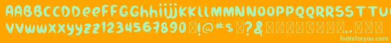 Burukuduk Font – Green Fonts on Orange Background