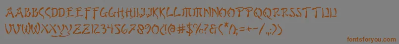 フォントbushido – 茶色の文字が灰色の背景にあります。