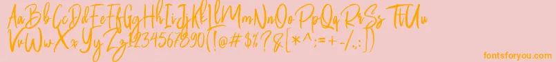 Butter Luchy Free-Schriftart – Orangefarbene Schriften auf rosa Hintergrund