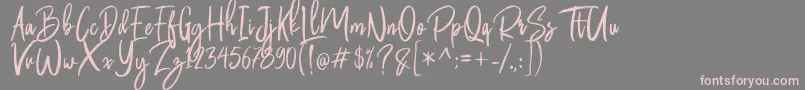 Butter Luchy Free Font – Pink Fonts on Gray Background