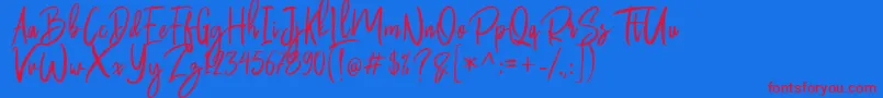 Butter Luchy Free-Schriftart – Rote Schriften auf blauem Hintergrund