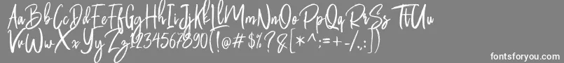 Butter Luchy Free-Schriftart – Weiße Schriften auf grauem Hintergrund
