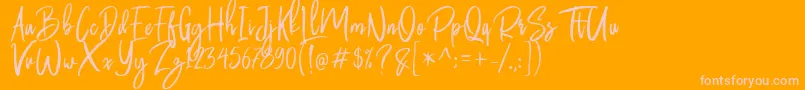 Butter Luchy Free-Schriftart – Rosa Schriften auf orangefarbenem Hintergrund