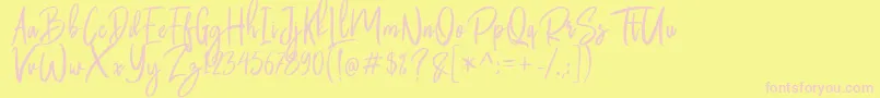 Butter Luchy Free-Schriftart – Rosa Schriften auf gelbem Hintergrund