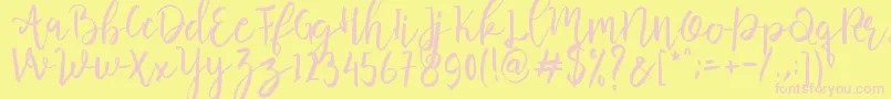 Butter Mellow  -Schriftart – Rosa Schriften auf gelbem Hintergrund