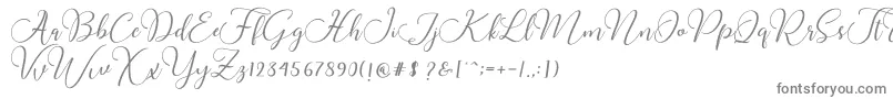 フォントButtercup Script – 白い背景に灰色の文字